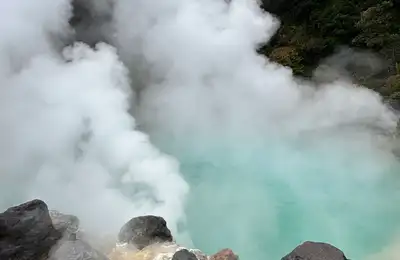 Kyushu's finest fall foliage, a legendary hand-carved tunnel, and the steaming "Hells of Beppu".