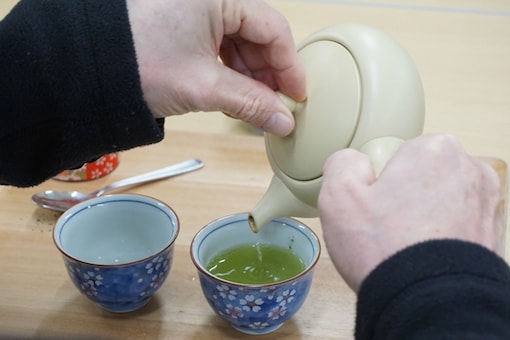 Pouring green tea